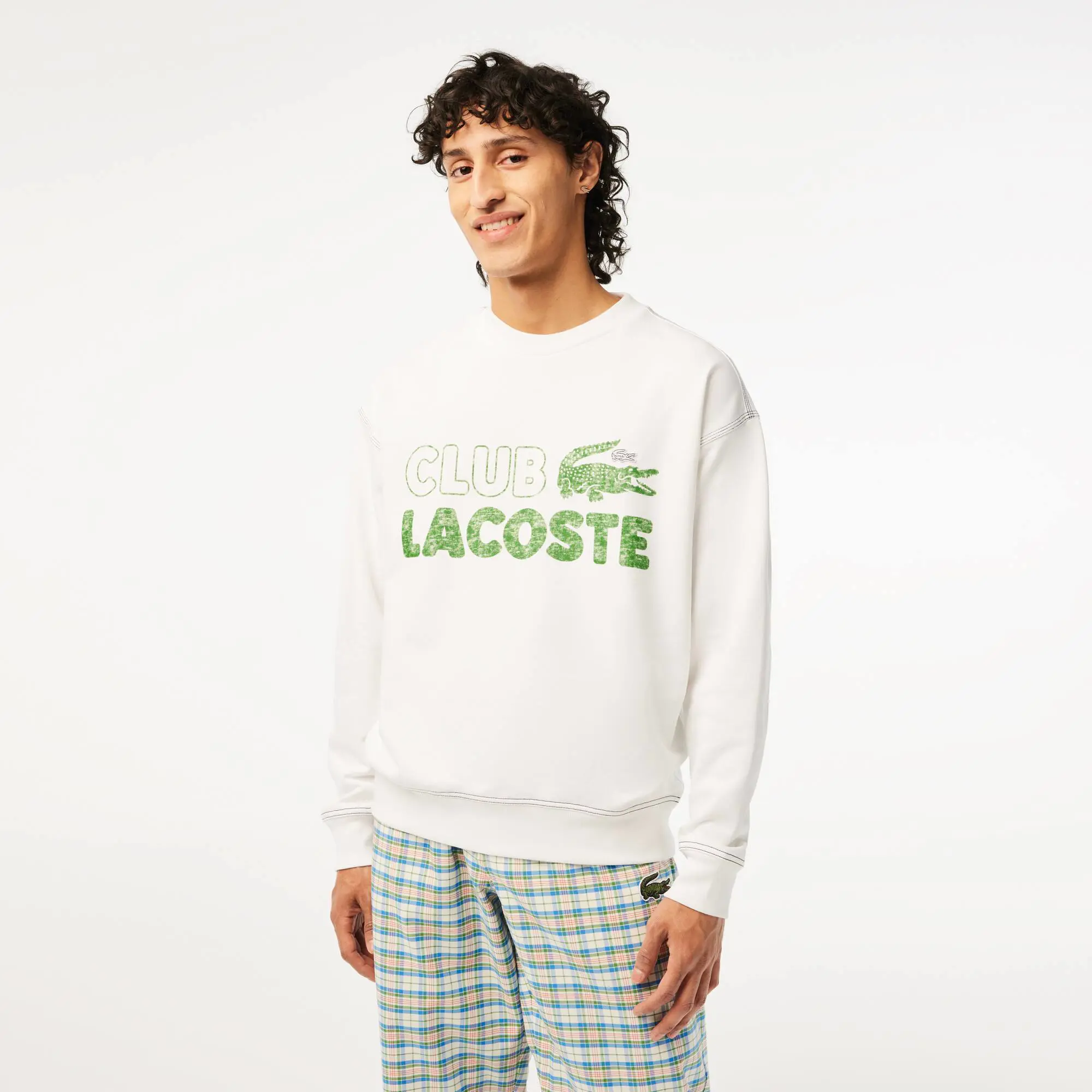 Lacoste Men’s Lacoste Round Neck Loose Fit Vintage Print Sweatshirt. 1