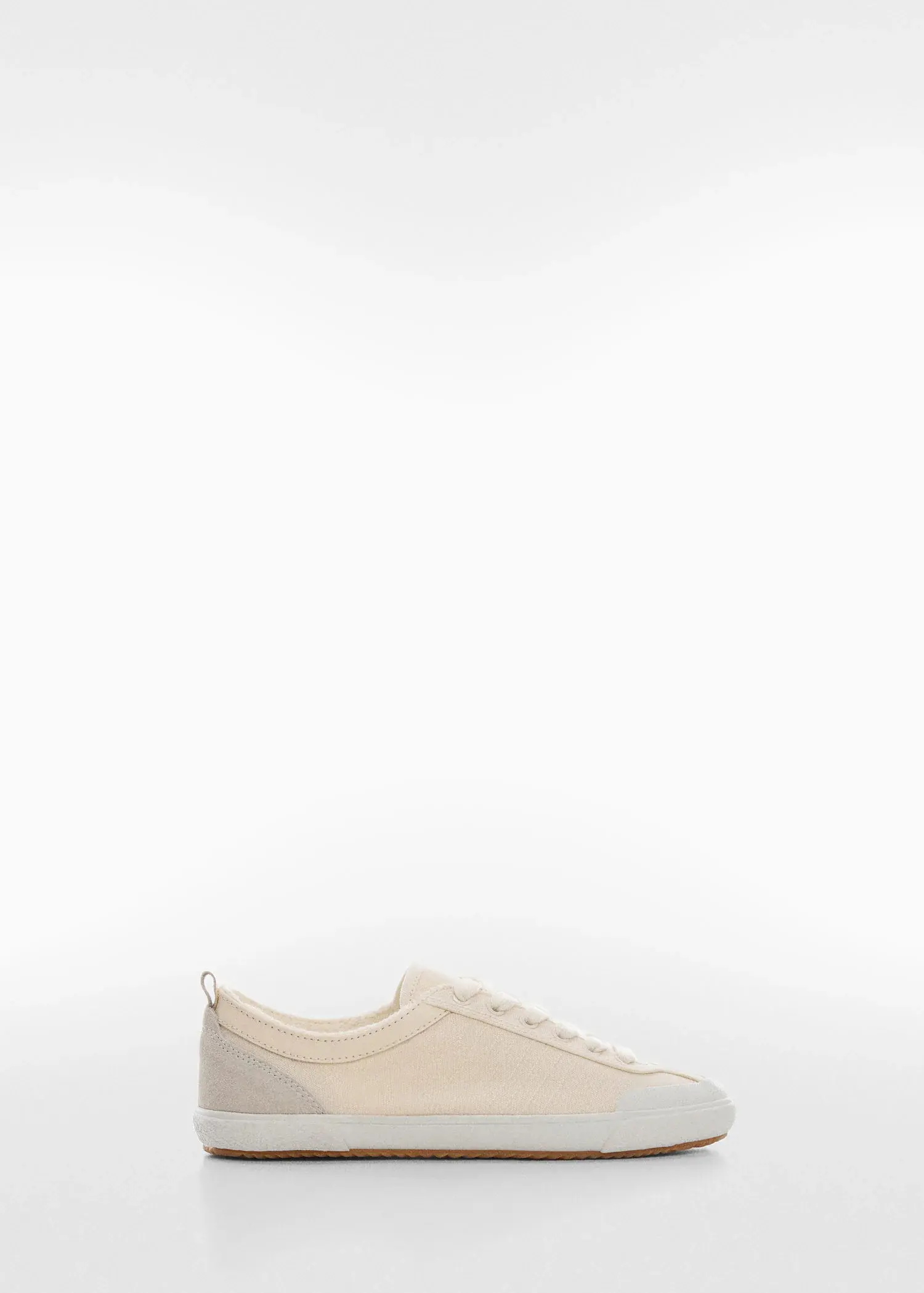 Mango Decorative seam sneakers. a pair of white shoes sitting on top of a white floor. 