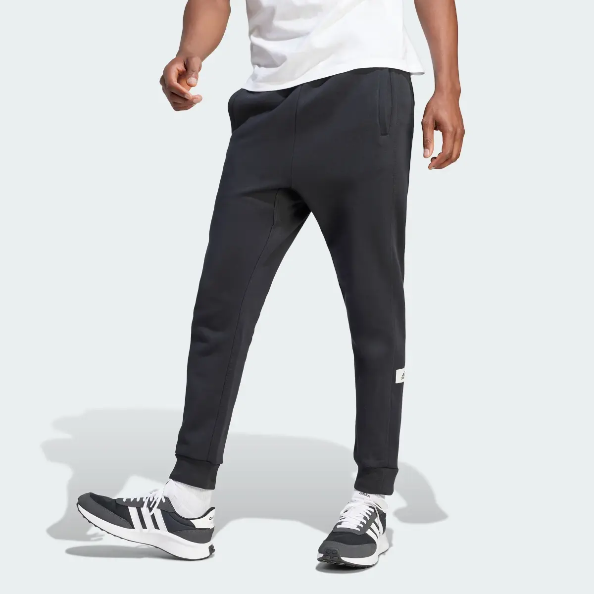 Adidas Lounge Fleece Pants. 1