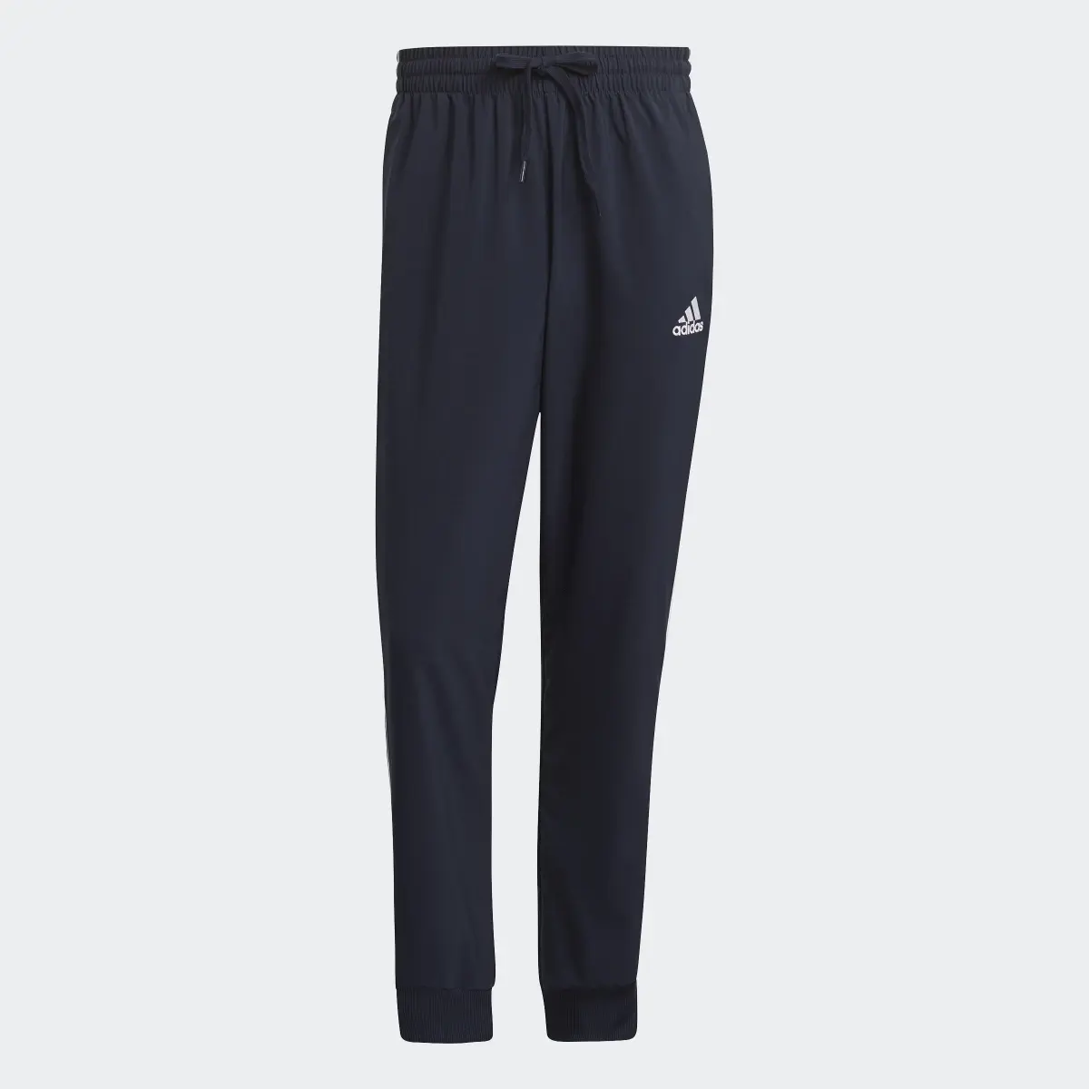 Adidas AEROREADY Essentials Tapered-Cuff Woven 3-Stripes Pants. 1