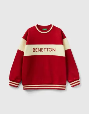 red sweatshirt with embroidered logo