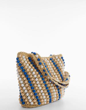 Natural fibre bag with beads