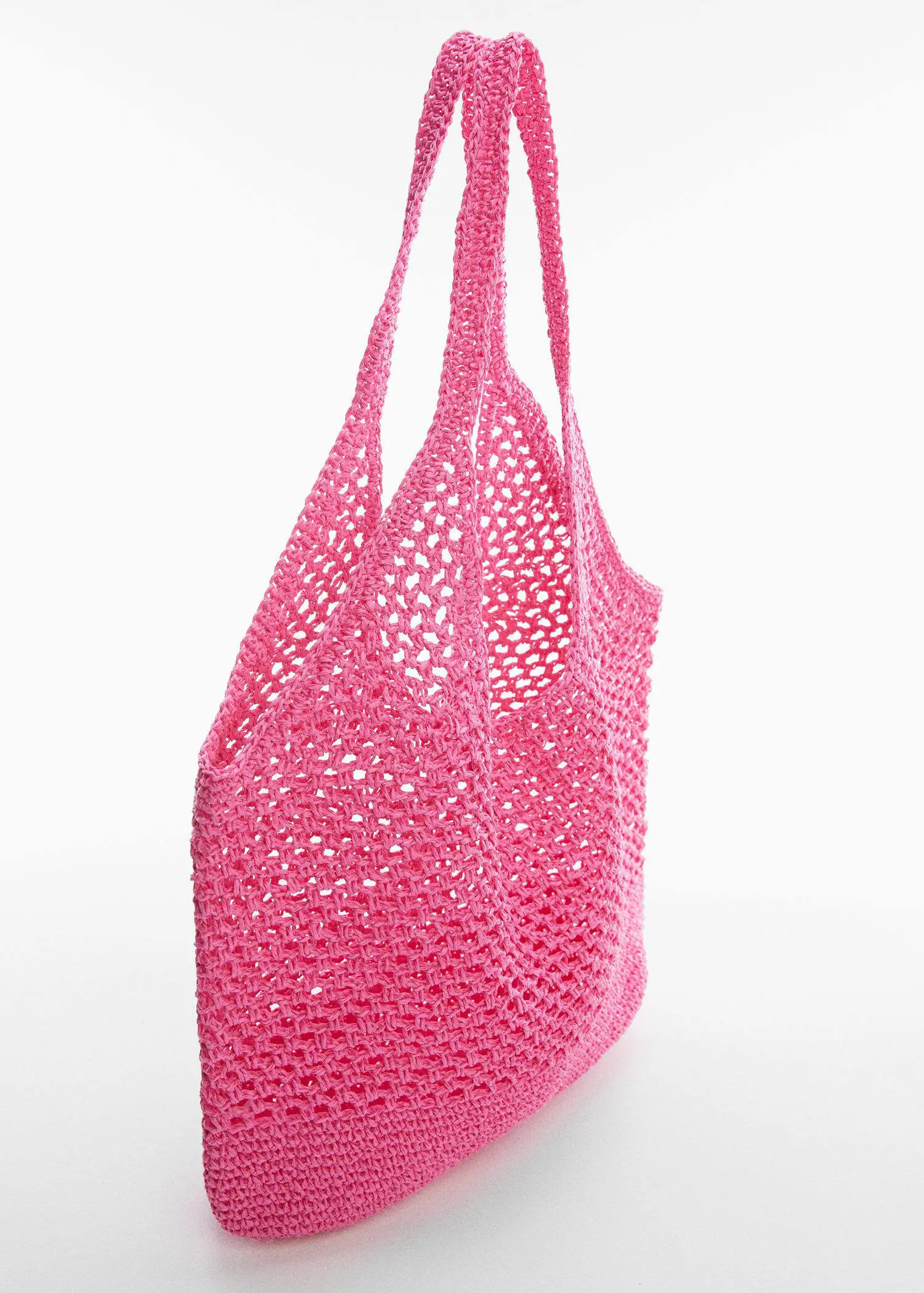 Mango Natural fiber sack bag. a close up of a pink crocheted bag. 