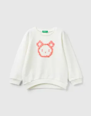 sweatshirt with petal applique