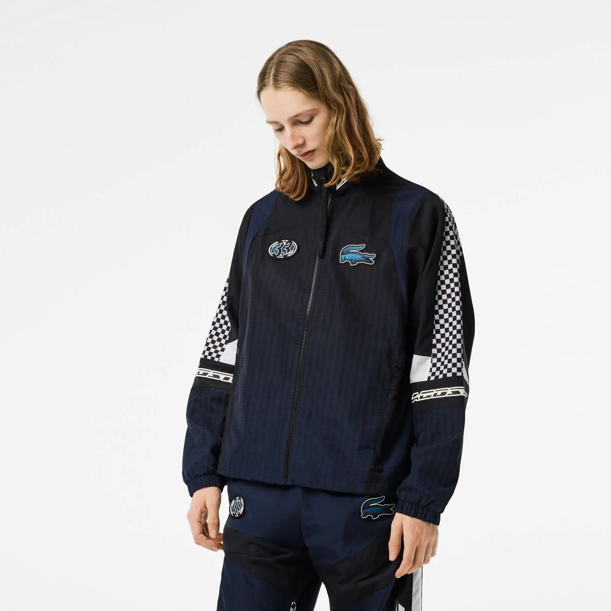 Lacoste Veste de survêtement homme Lacoste dégradé et imprimé damier. 1 Lacoste Veste de survêtement homme Lacoste dégradé et imprimé damier. 1