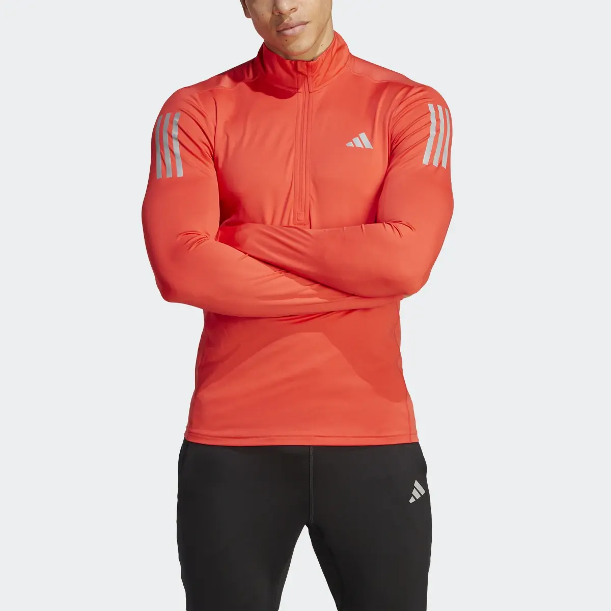 Adidas Own the Run 1/4 Zip Long Sleeve Sweatshirt. 1