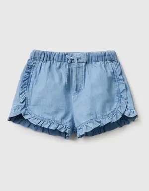 shorts in chambray with ruffles