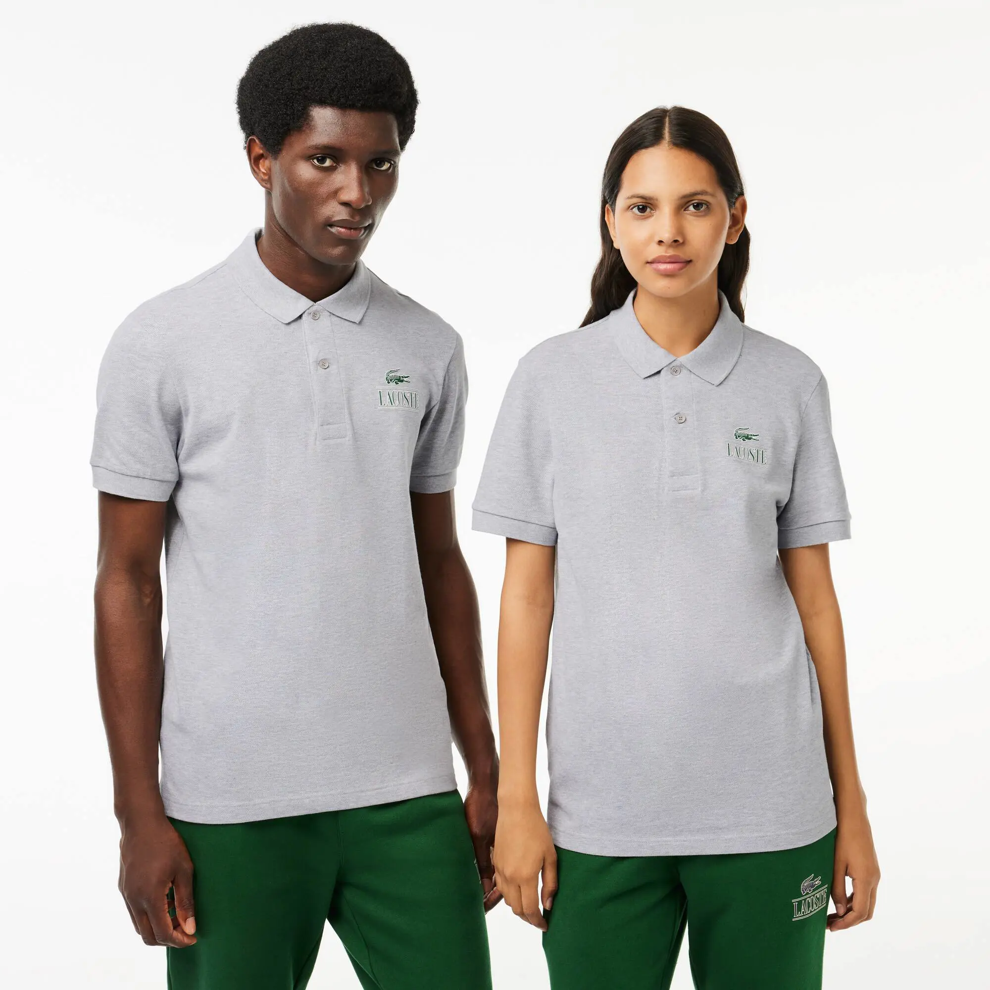Lacoste Polohemd mit LACOSTE-Signatur-Aufdruck. 1