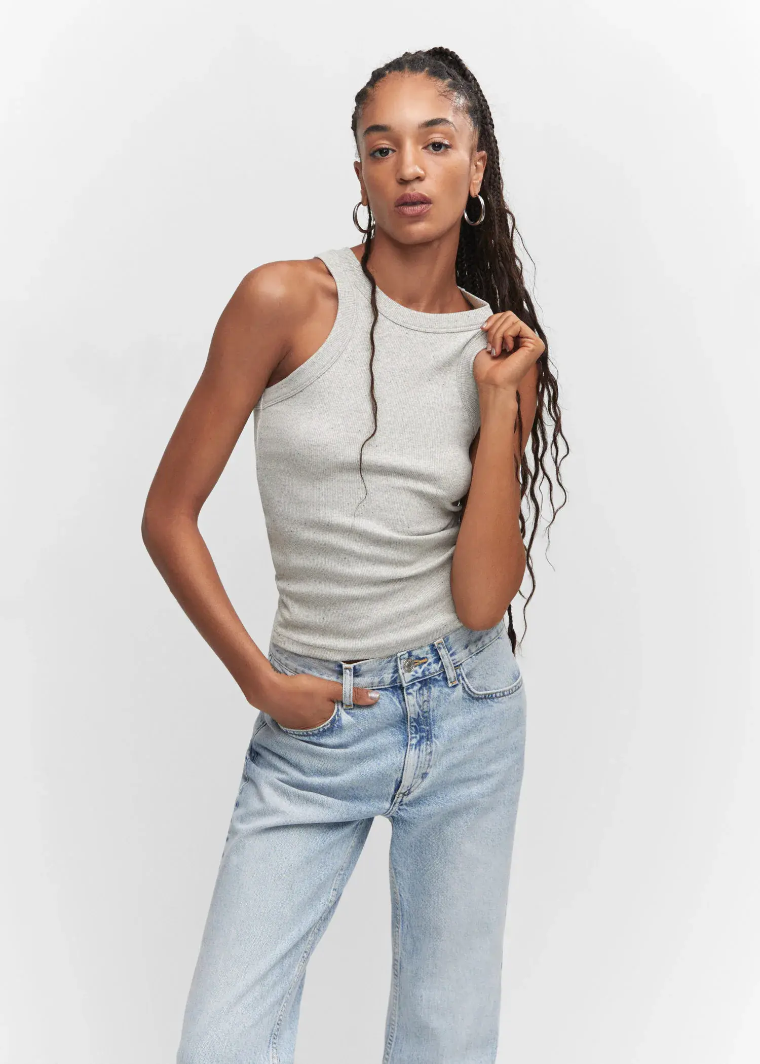 Mango Ribbed cotton-blend top. a woman in a white tank top is posing for a picture 