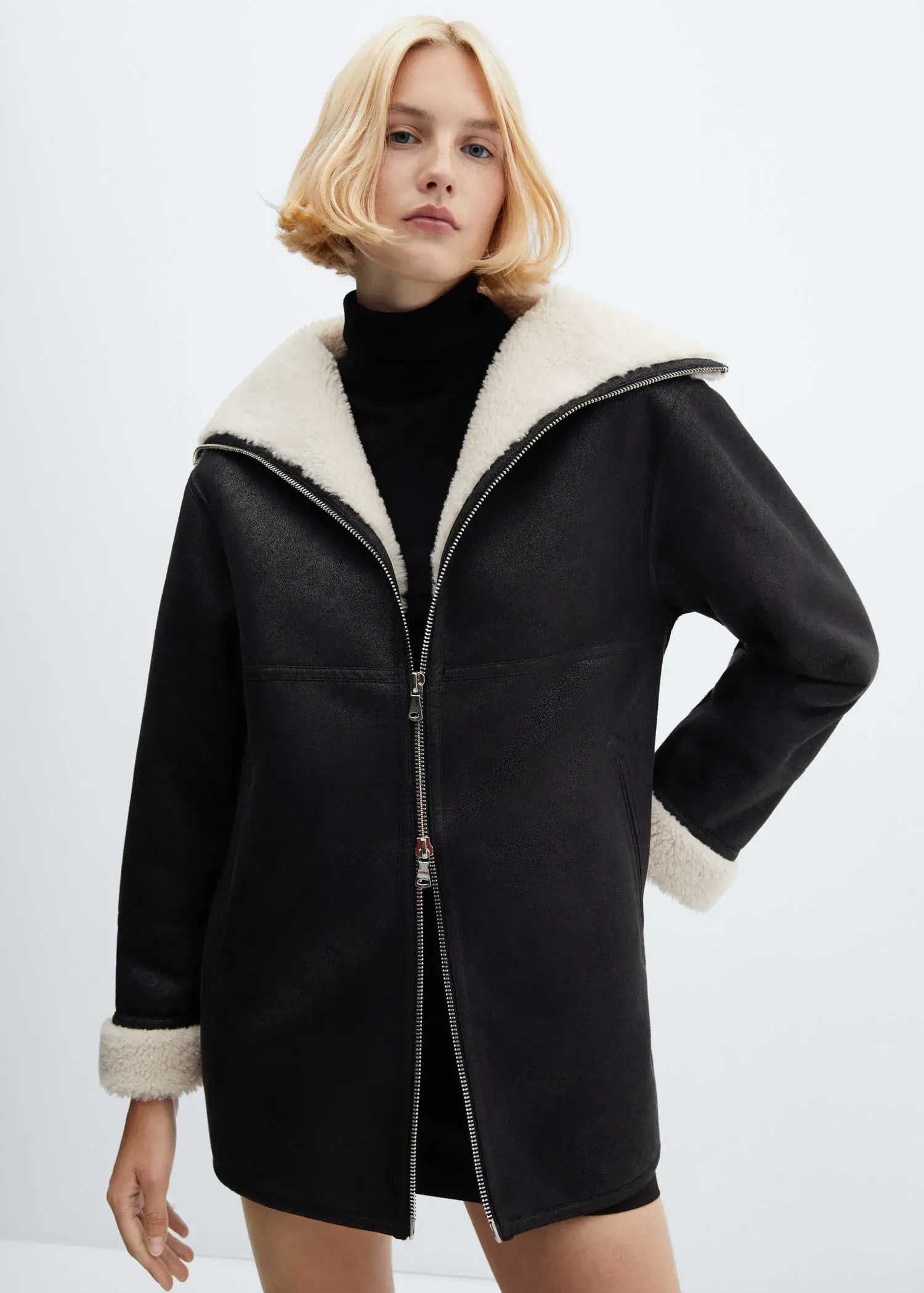 Mango Shearling-lined coat with zip. 2