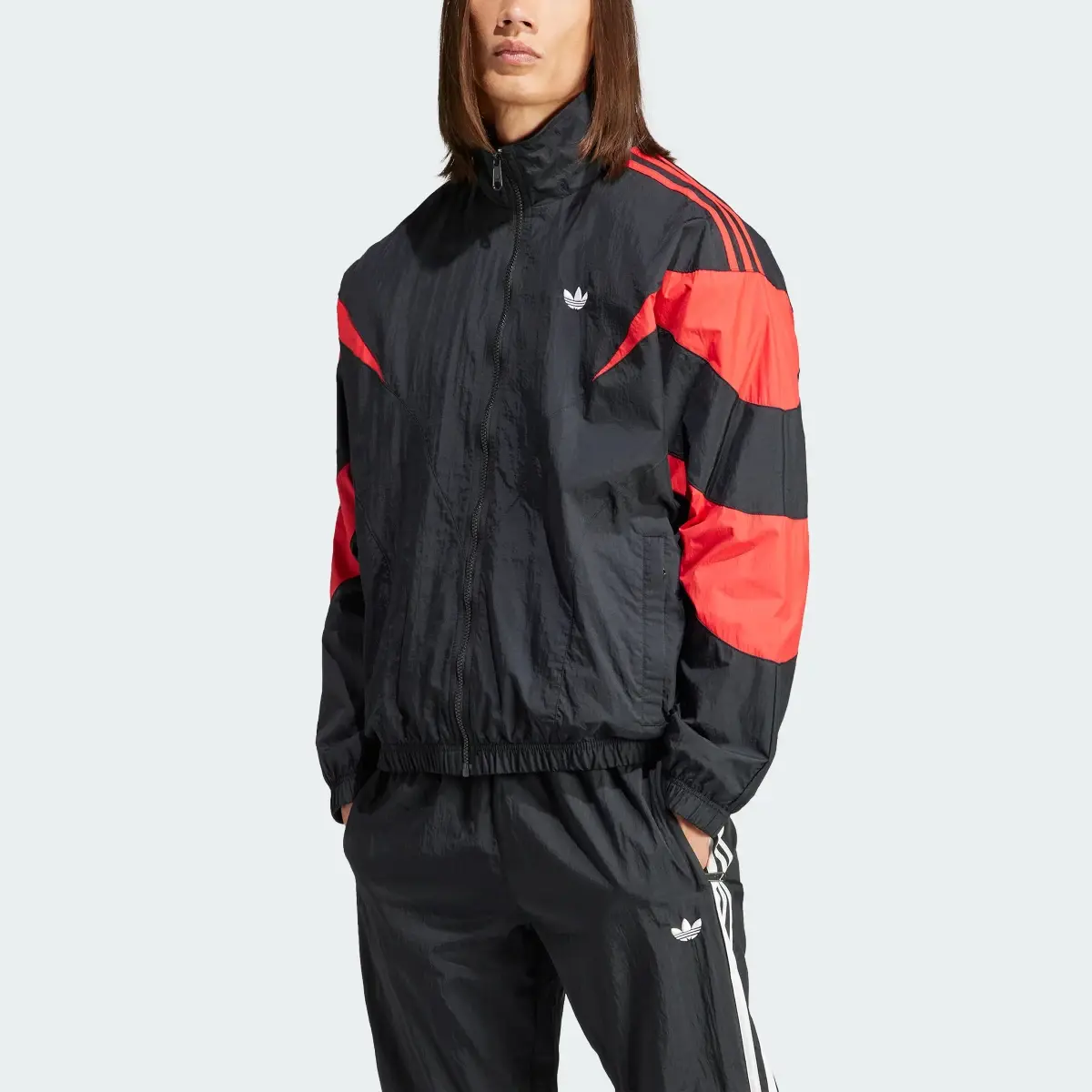 Adidas Rekive Woven Track Jacket. 1