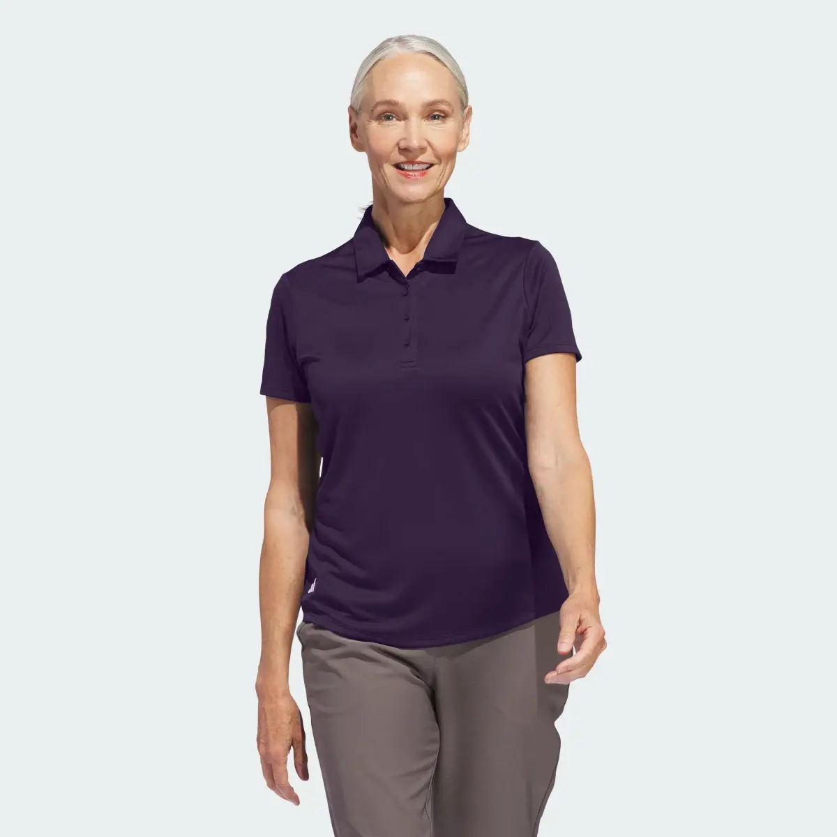 Adidas Women's Solid Performance Short Sleeve Polo Shirt. 2