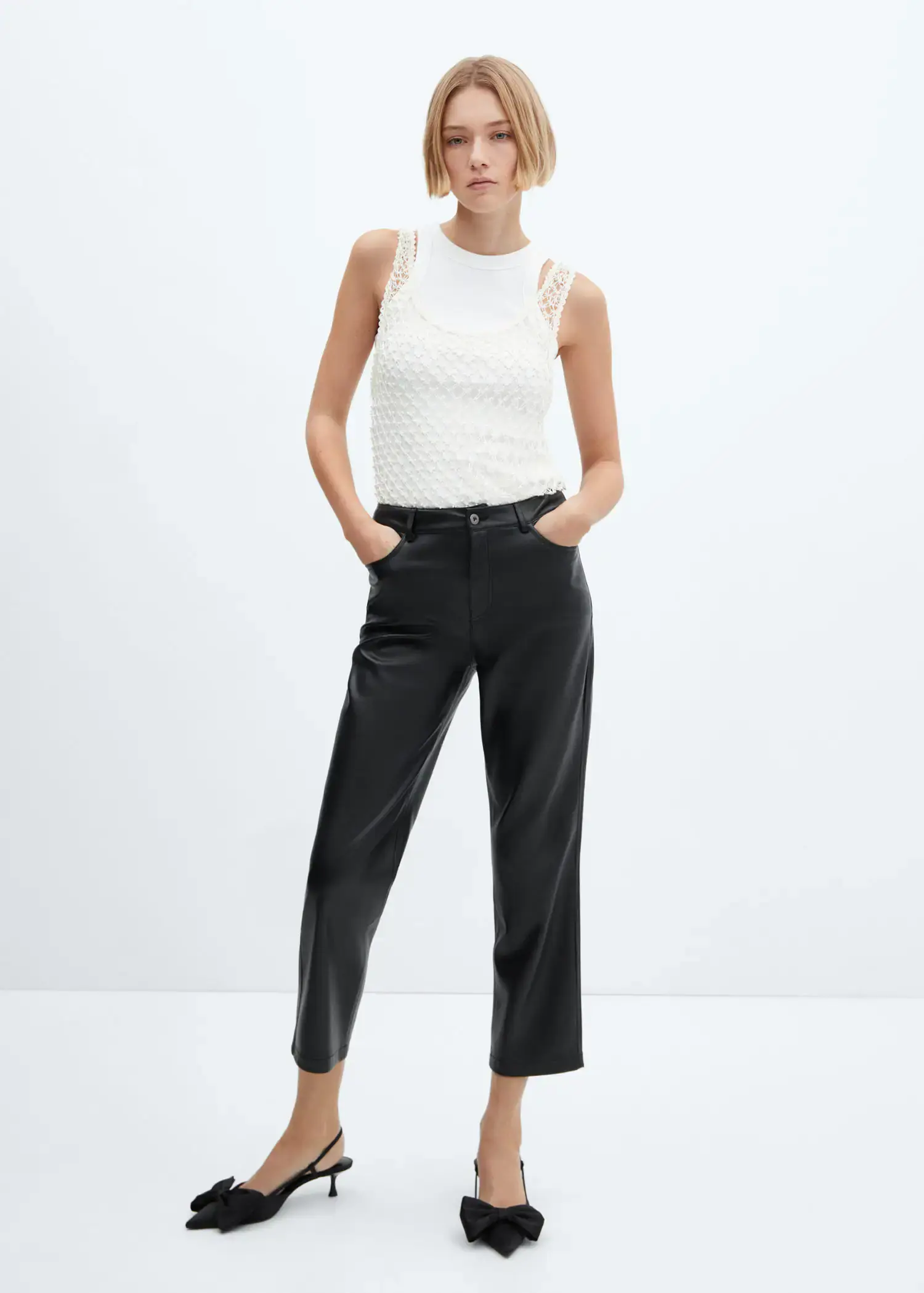 Mango Leather-effect straight trousers. 1