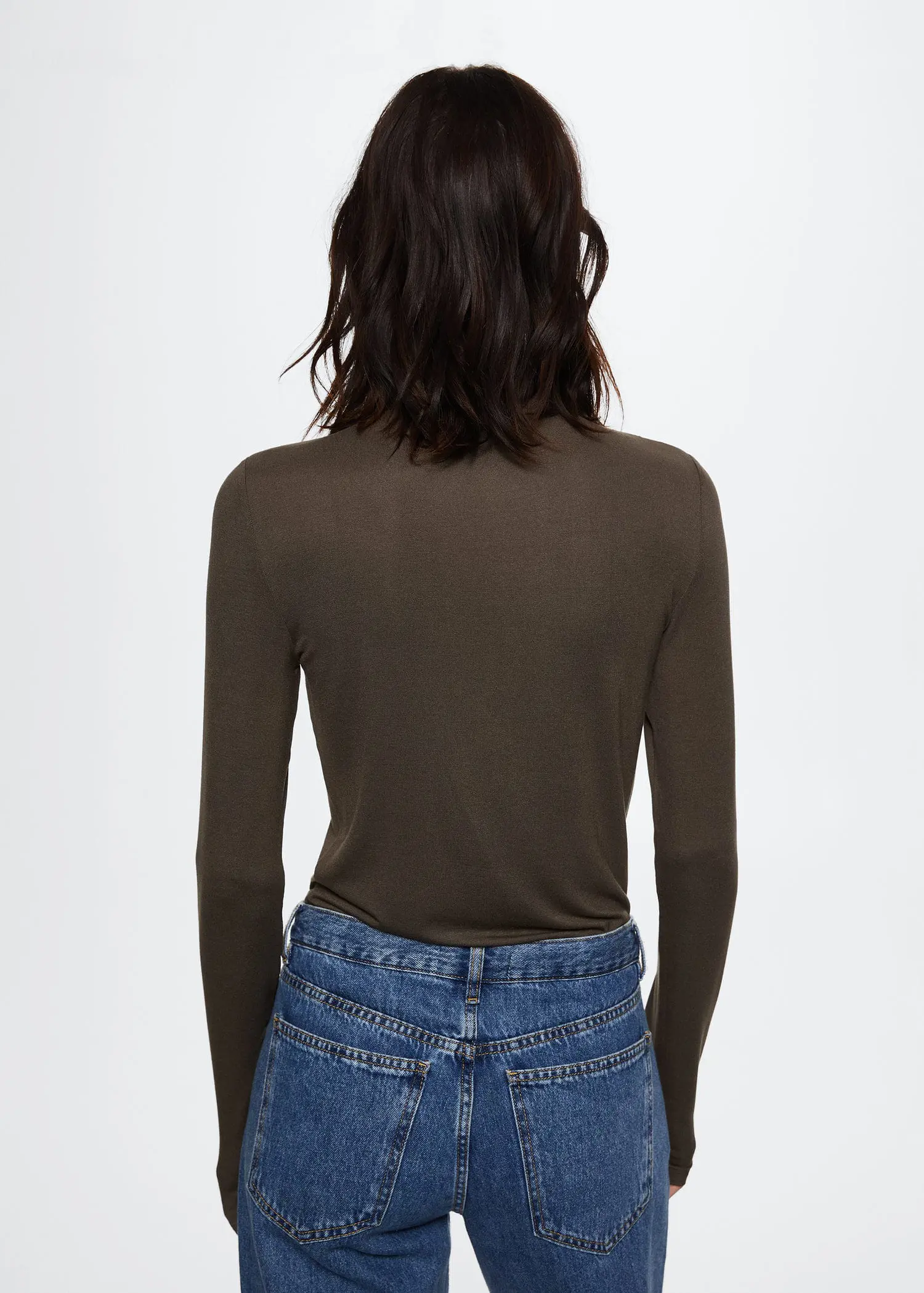 Mango Ruched detail T-shirt. a woman wearing a brown shirt and blue jeans. 