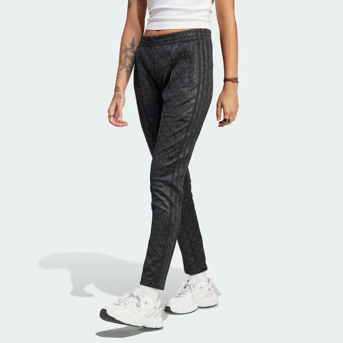 Adidas Adicolor Trefoil Monogram SST Track Pants. 1