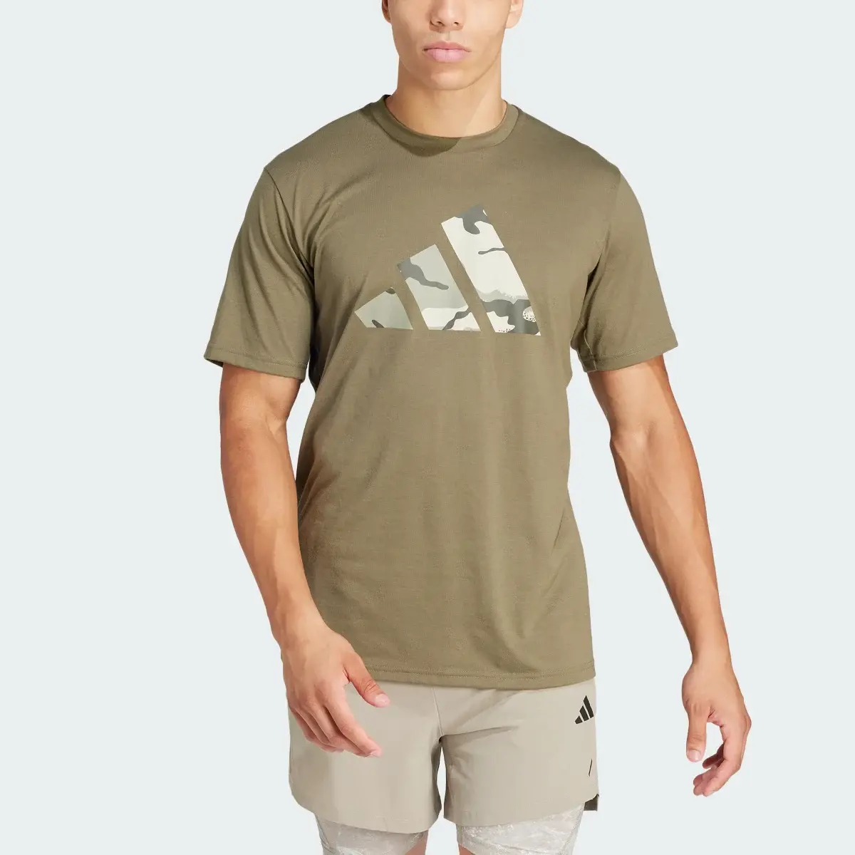 Adidas Train Essentials Seasonal Brand Love Camo Tee. 1