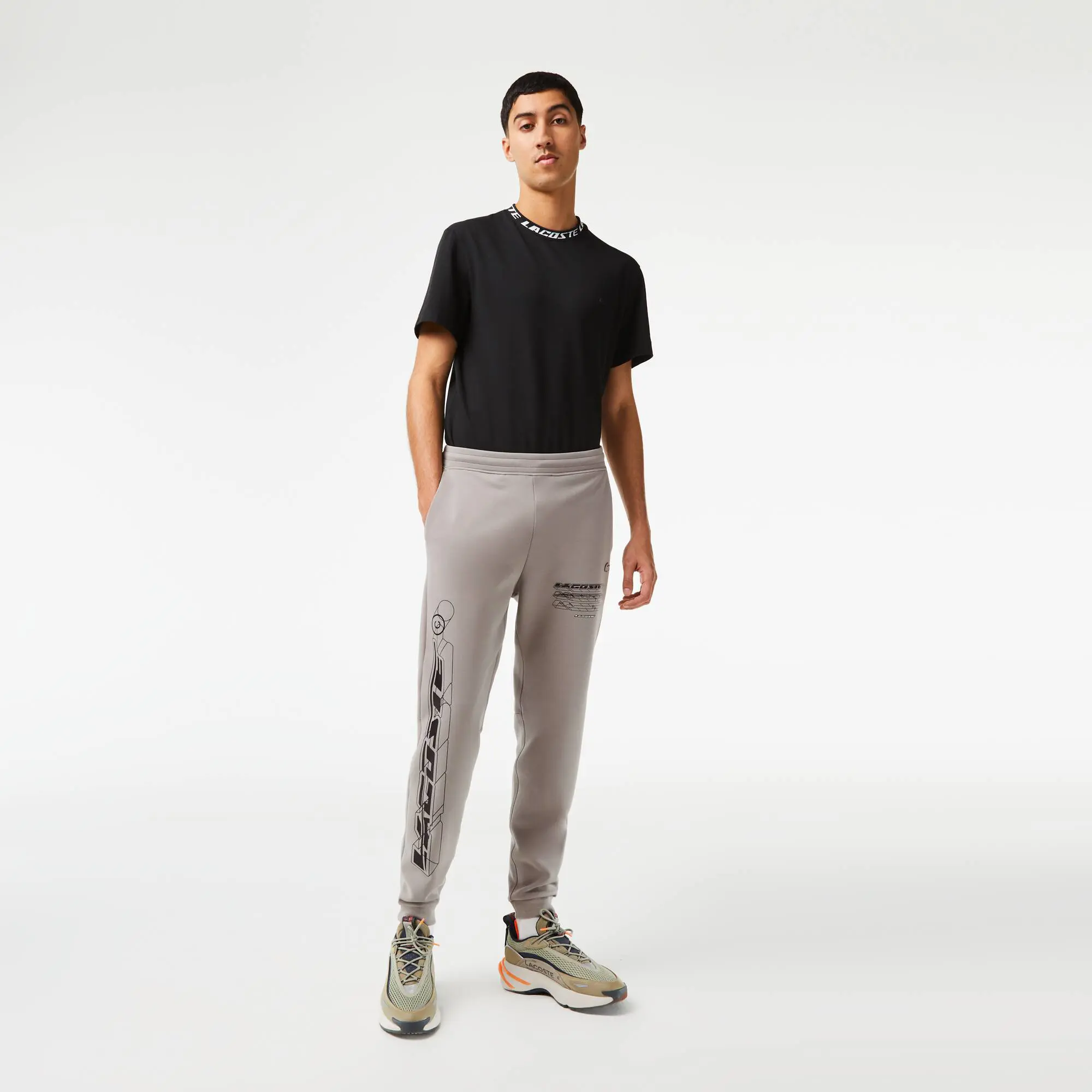 Lacoste Men’s Lacoste Slim Fit Double-Sided Track Pants. 1