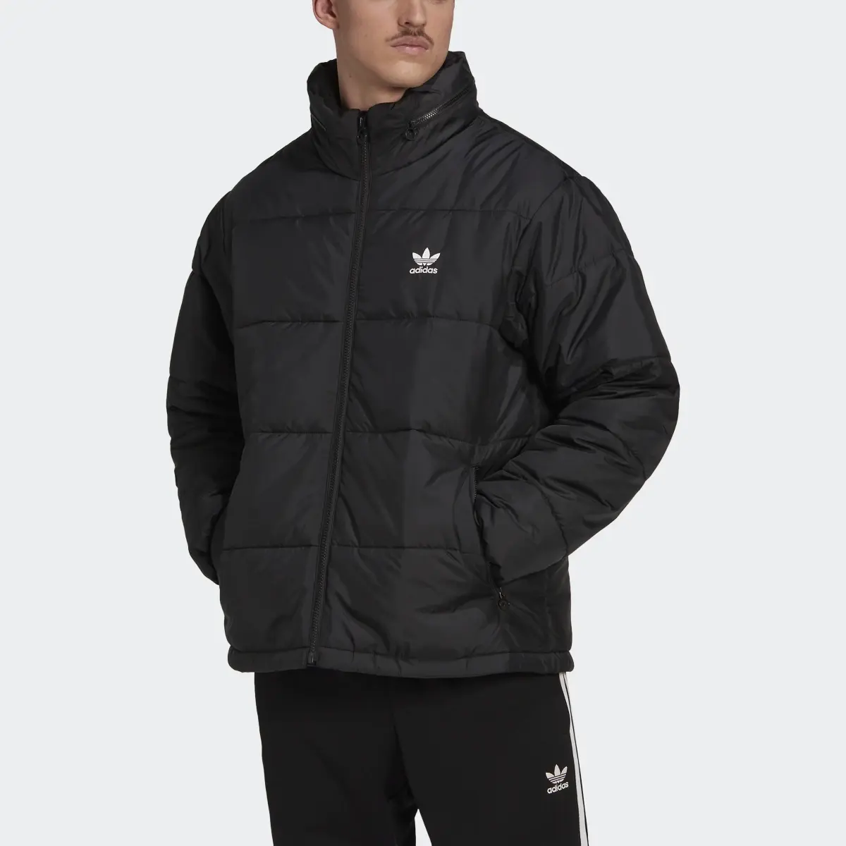 Adidas Giacca Essentials Padded Puffer. 1