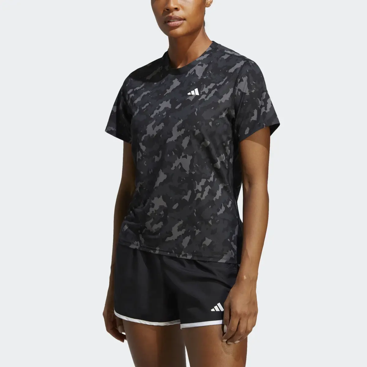 Adidas T-shirt da running Own the Run Camo. 1