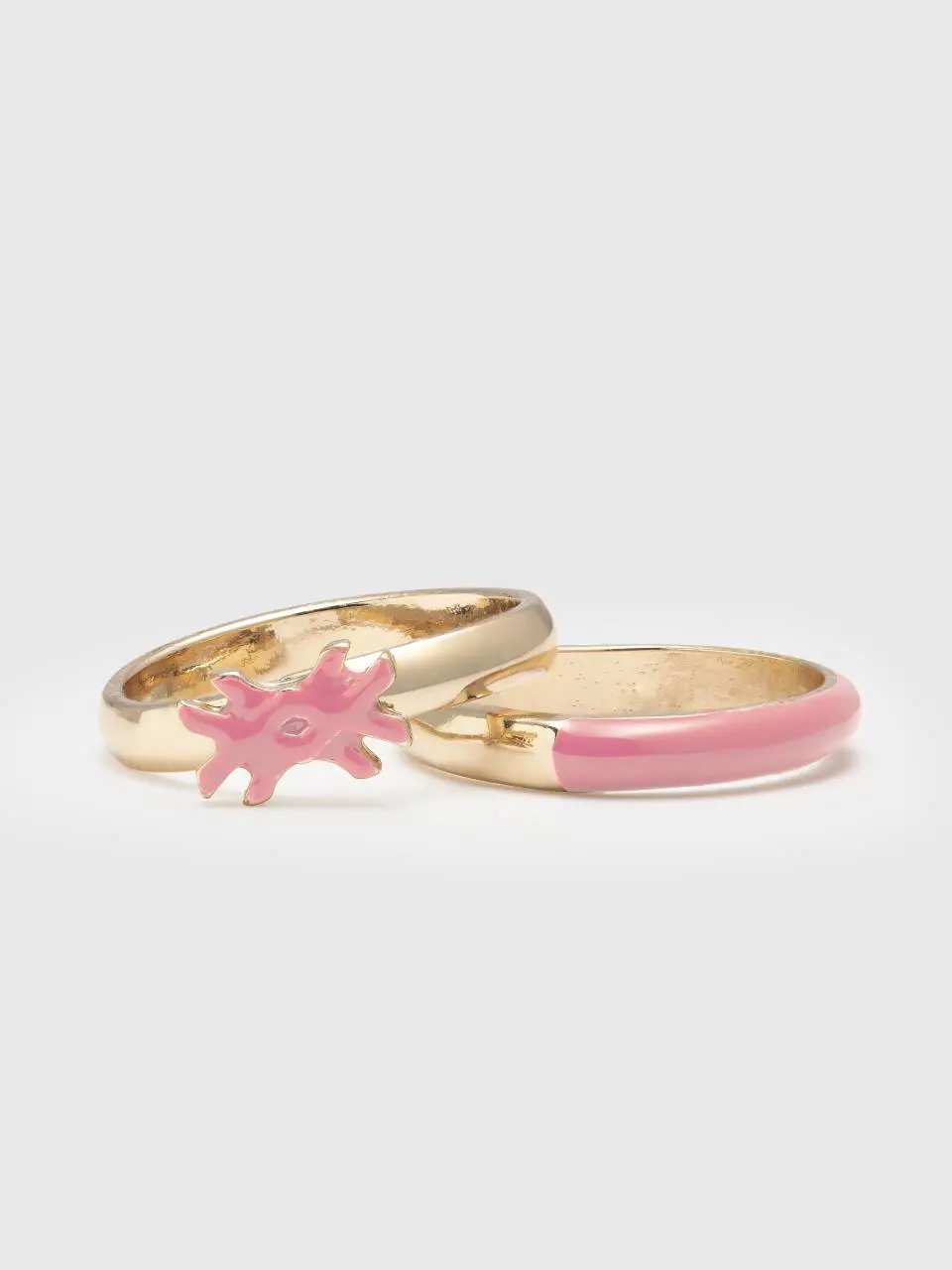 Benetton two rings with pink enamelled details. 1