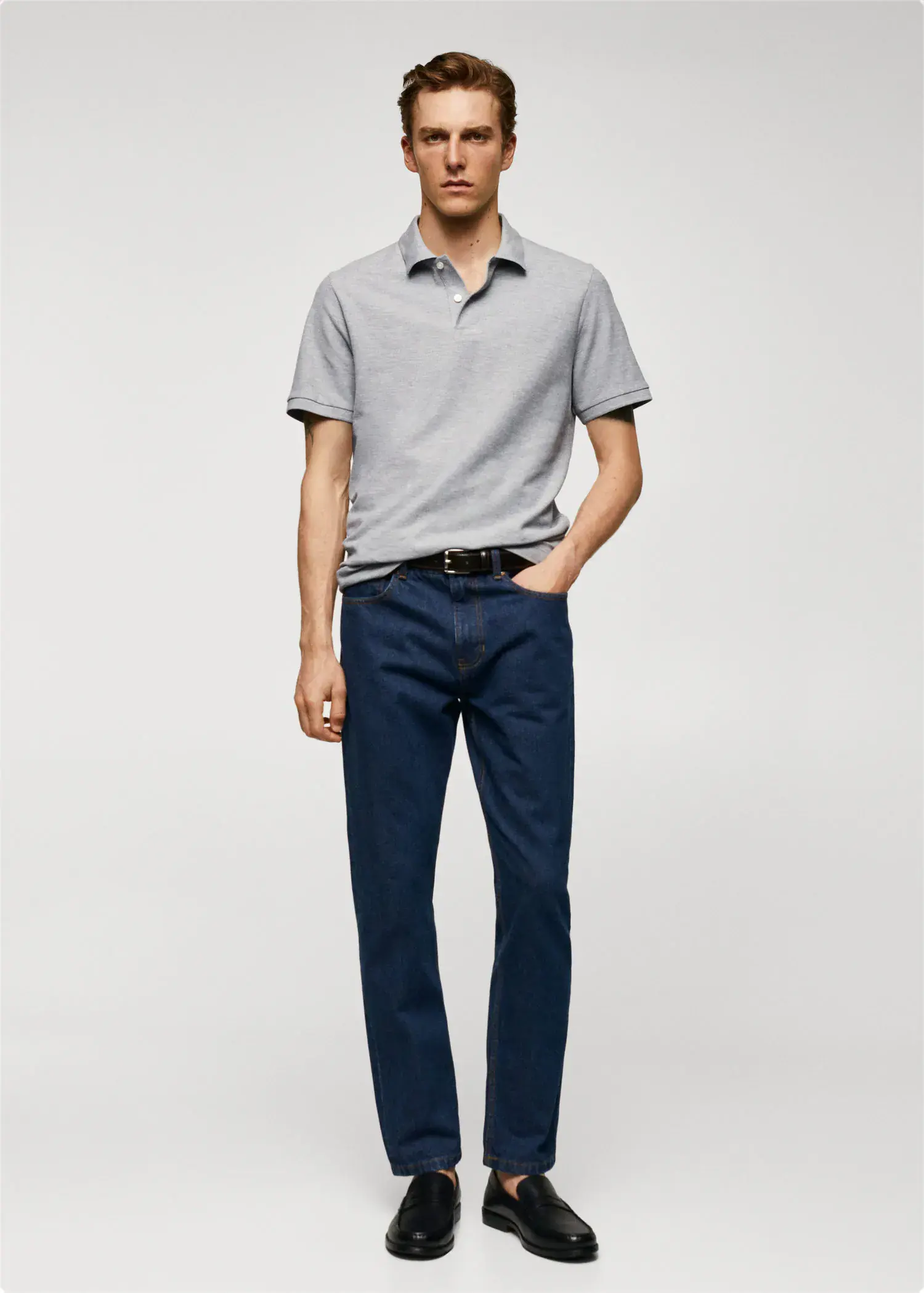 Mango 100% cotton pique polo shirt. a man in a gray polo shirt and blue pants. 
