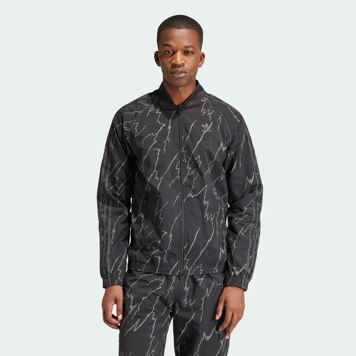 Adidas Allover Print SST Track Top. 2