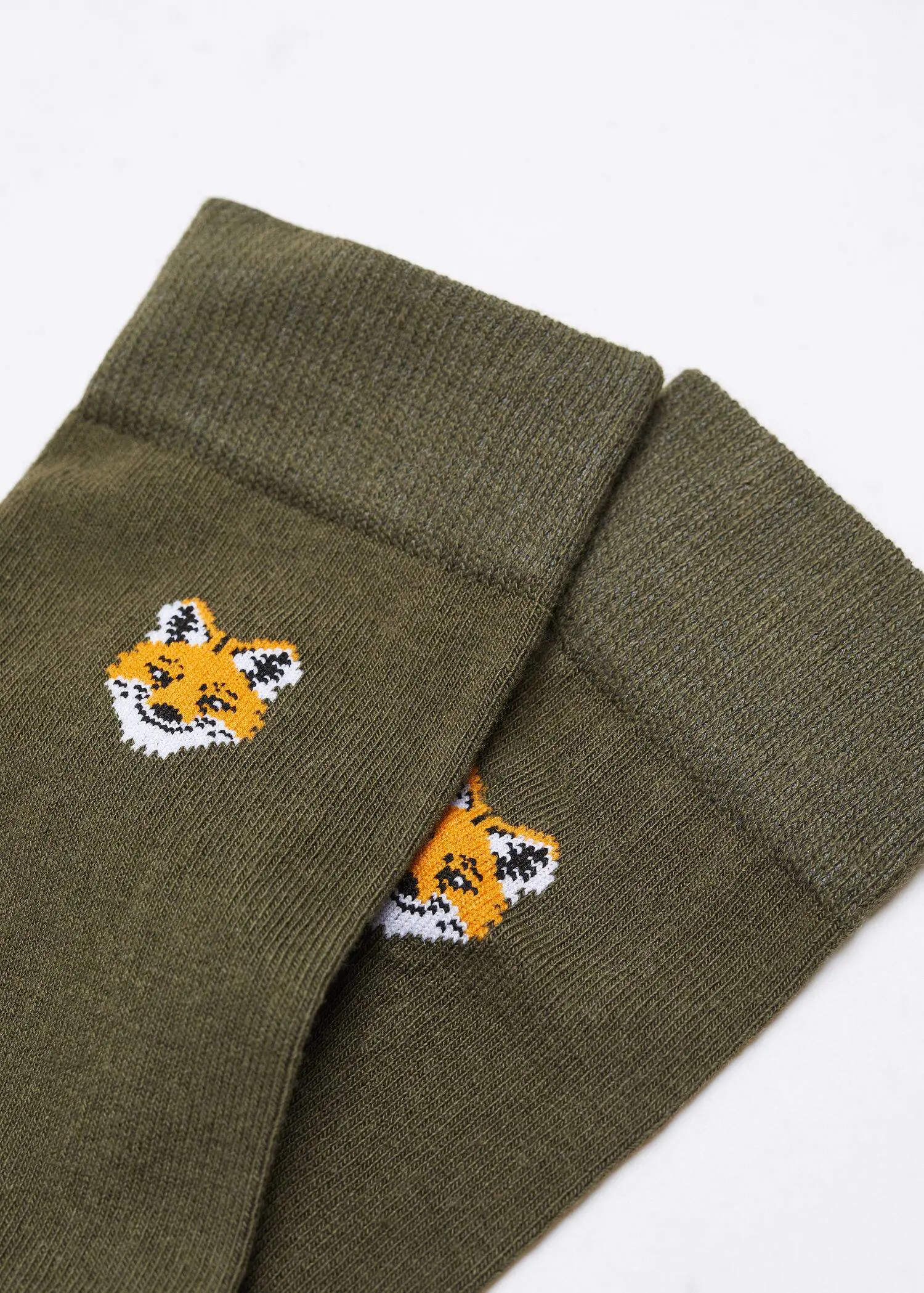 Mango Fox-embroidered cotton socks. a close up of a pair of socks on a table 
