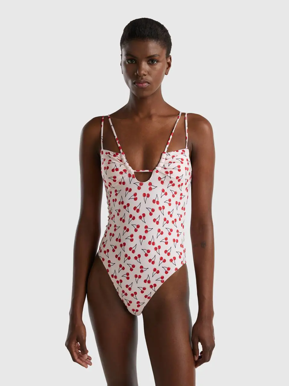 Benetton pink one-piece swimsuit with cherry pattern. 1
