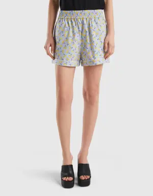 light blue shorts with cherry pattern