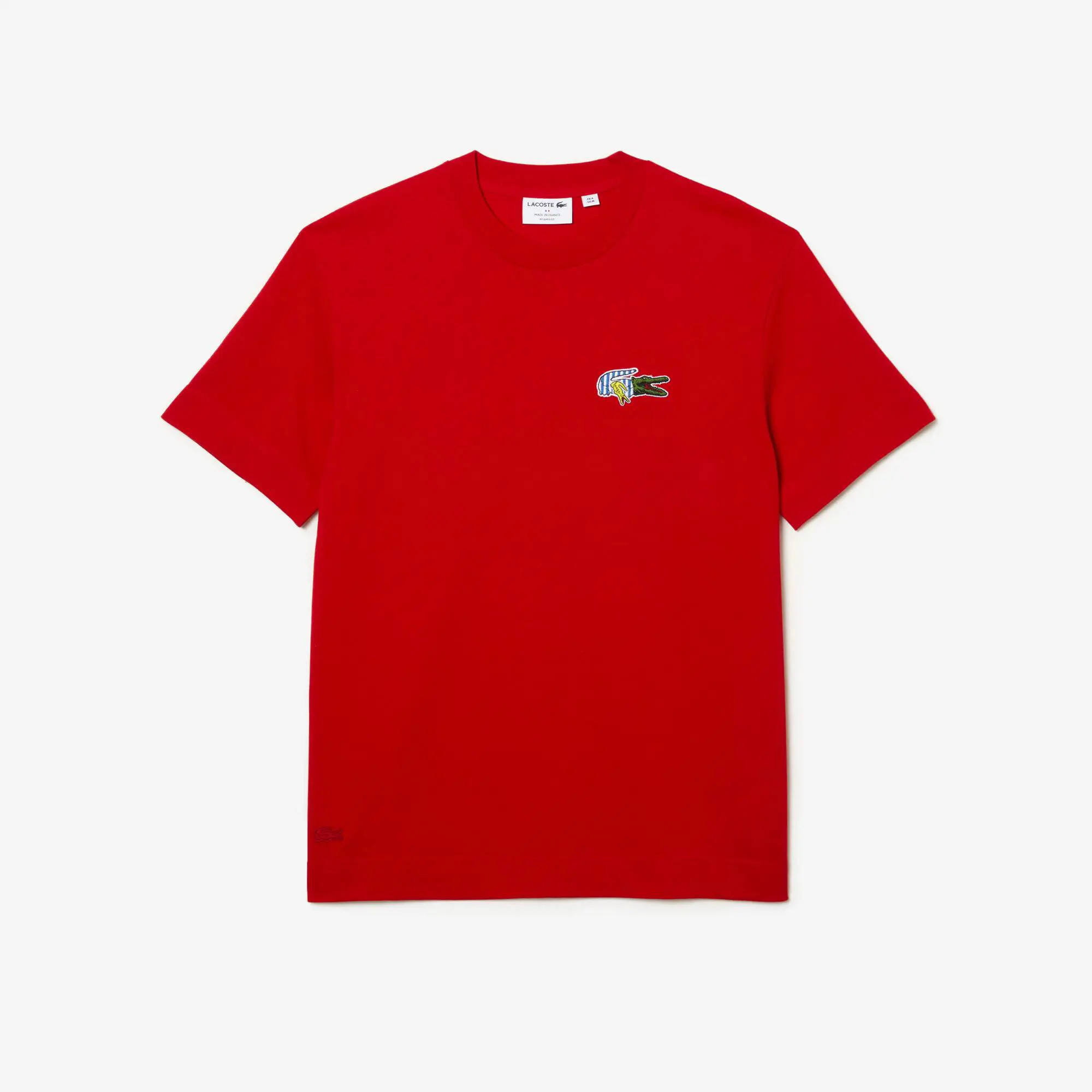 Lacoste T-shirt relaxed fit com emblema e efeito de banda desenhada Lacoste Holiday para homem. 2