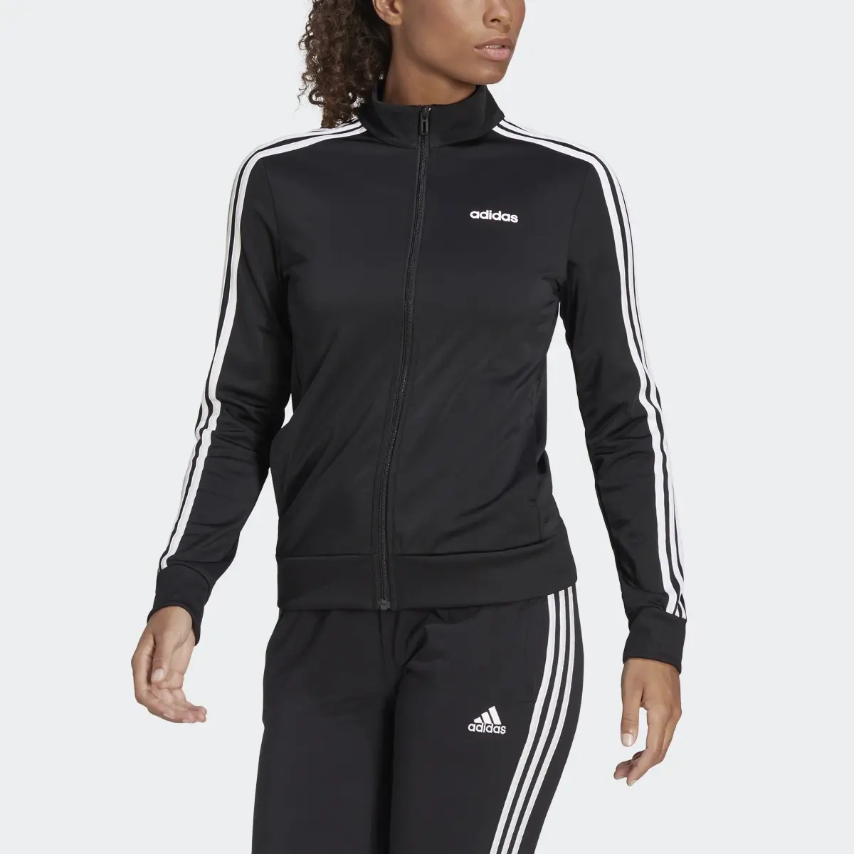Adidas Essentials Tricot Track Jacket. 1 Adidas Essentials Tricot Track Jacket. 1