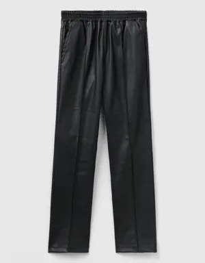 slim fit trousers in imitation leather fabric