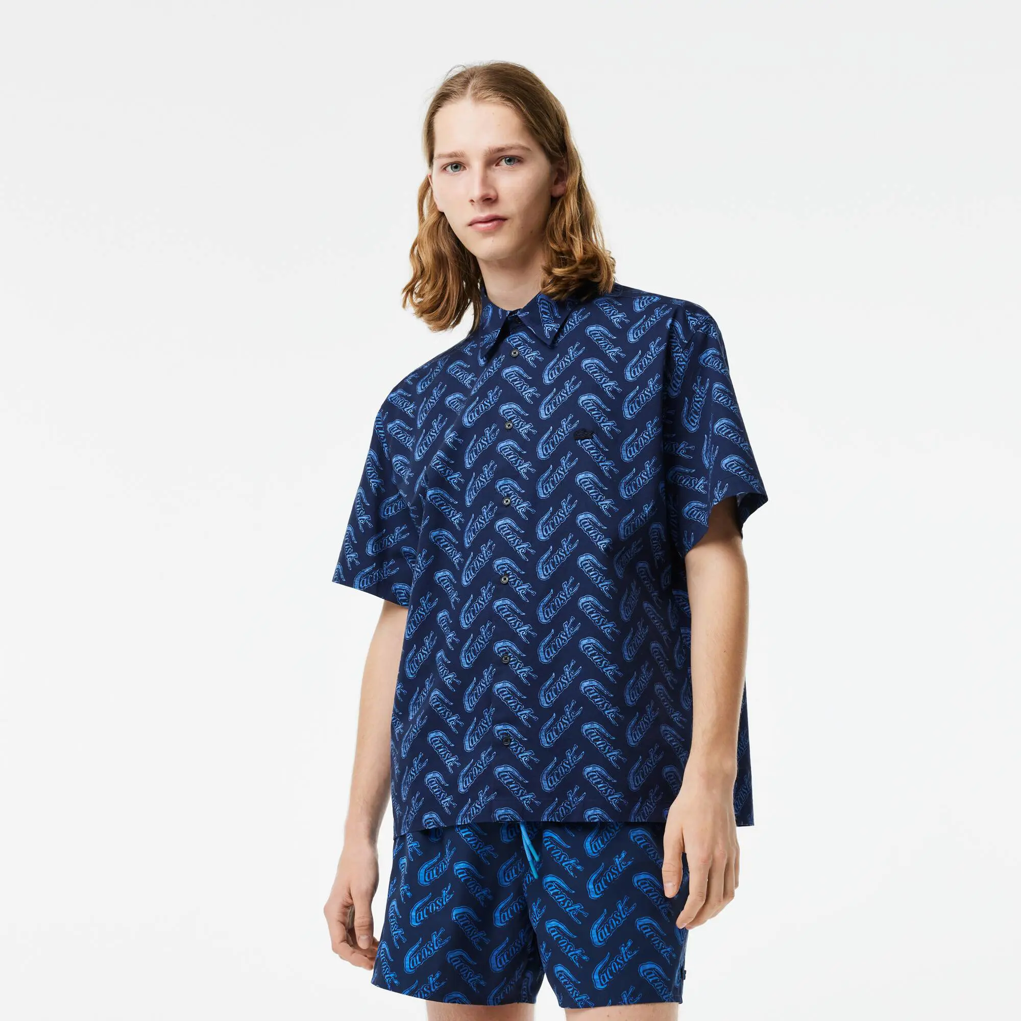 Lacoste Men’s Short Sleeve Vintage Print Shirt. 1 Lacoste Men’s Short Sleeve Vintage Print Shirt. 1