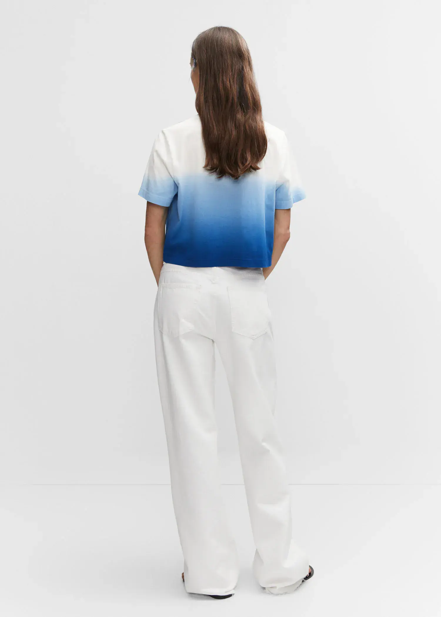 Mango Cotton ombré t-shirt. a woman standing in front of a white wall. 