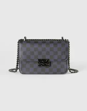 small be bag with blue and black checkers