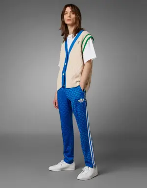 Adidas Adicolor 70s Monogram Tracksuit Bottoms. 3 Adidas Adicolor 70s Monogram Tracksuit Bottoms. 3