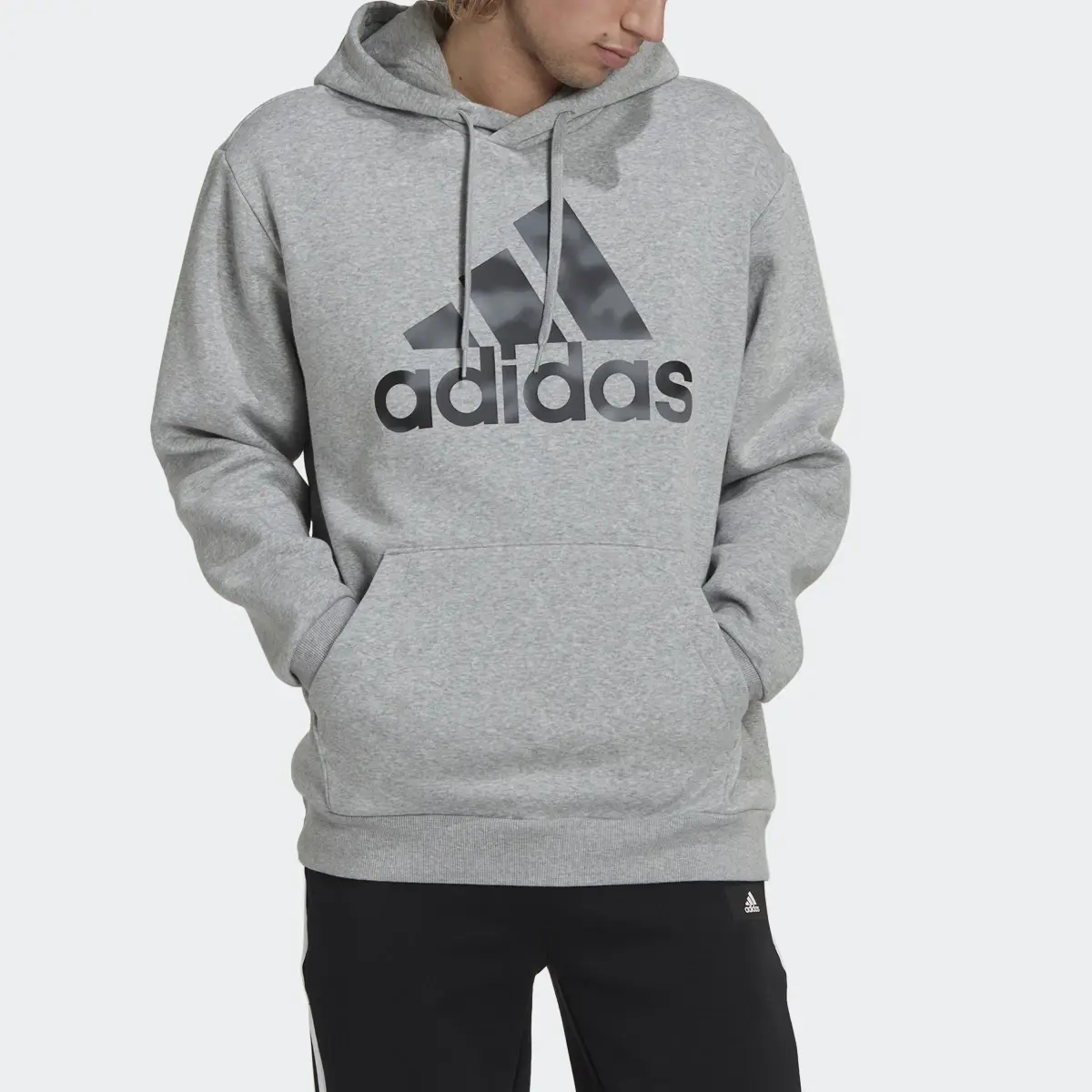Adidas Essentials Camo Print French Terry Hoodie. 1