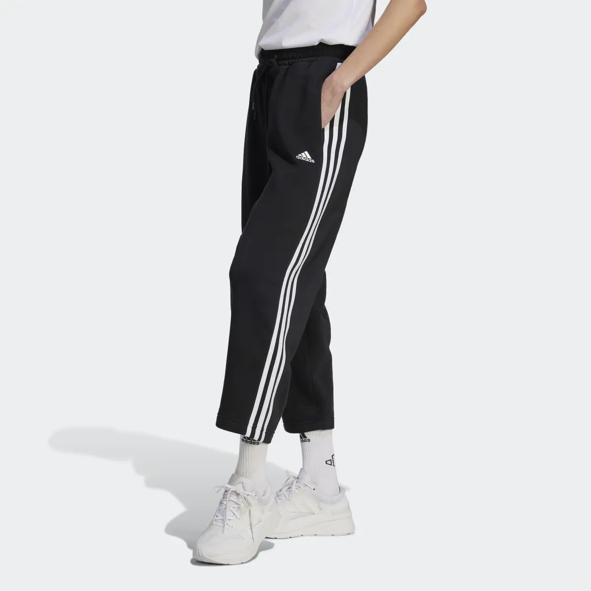 Adidas Essentials 3-Stripes Open Hem Fleece Pants. 1