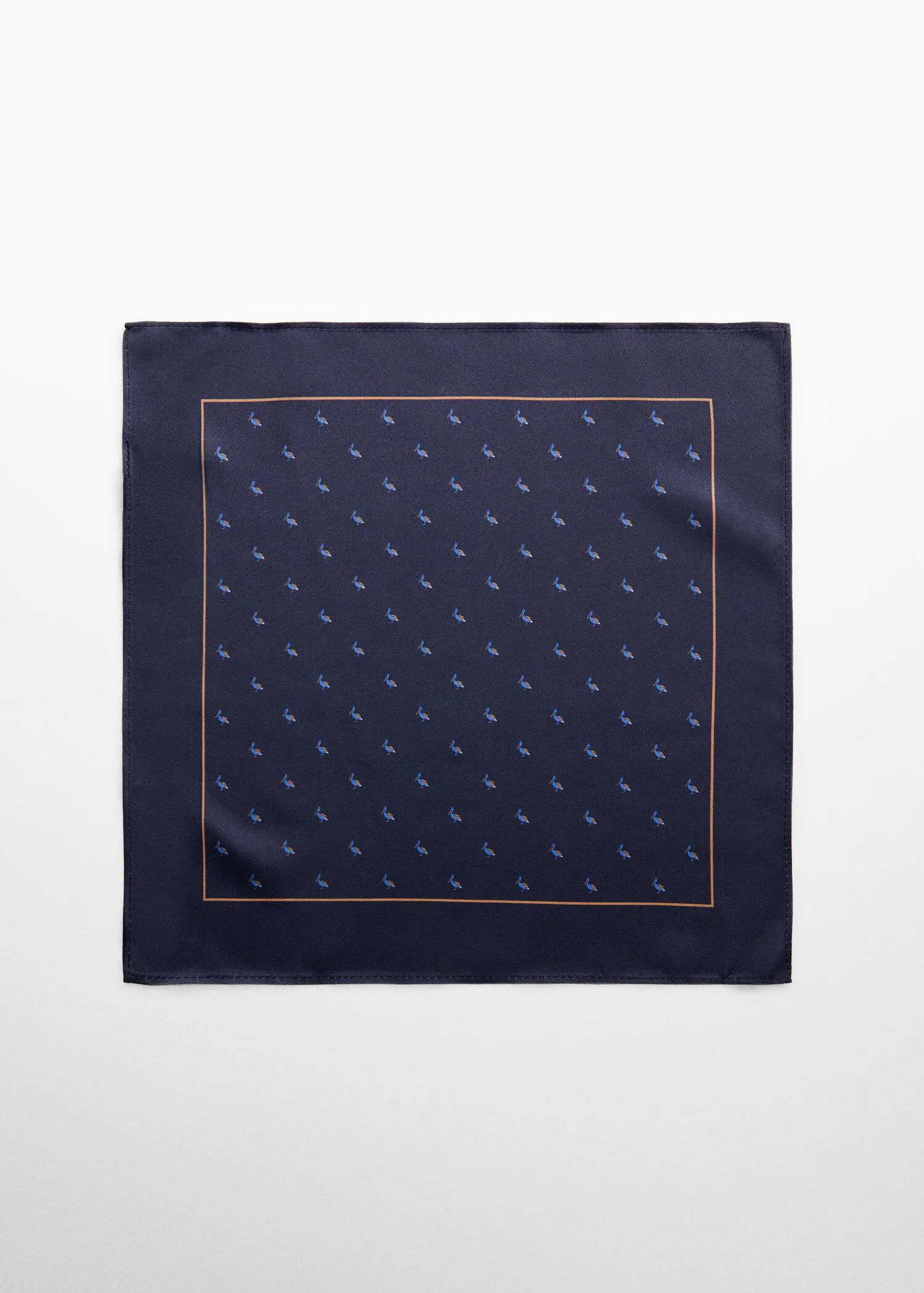 Mango Printed pocket square. a blue and white scarf on top of a table. 