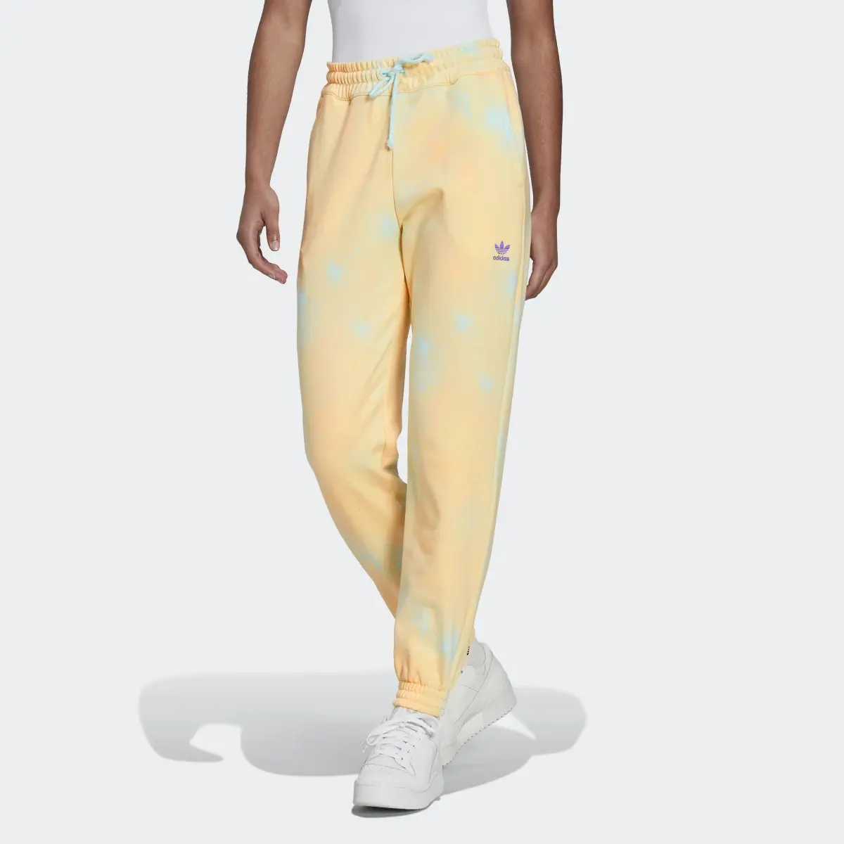 Adidas Allover Print Cuffed Joggers. 1