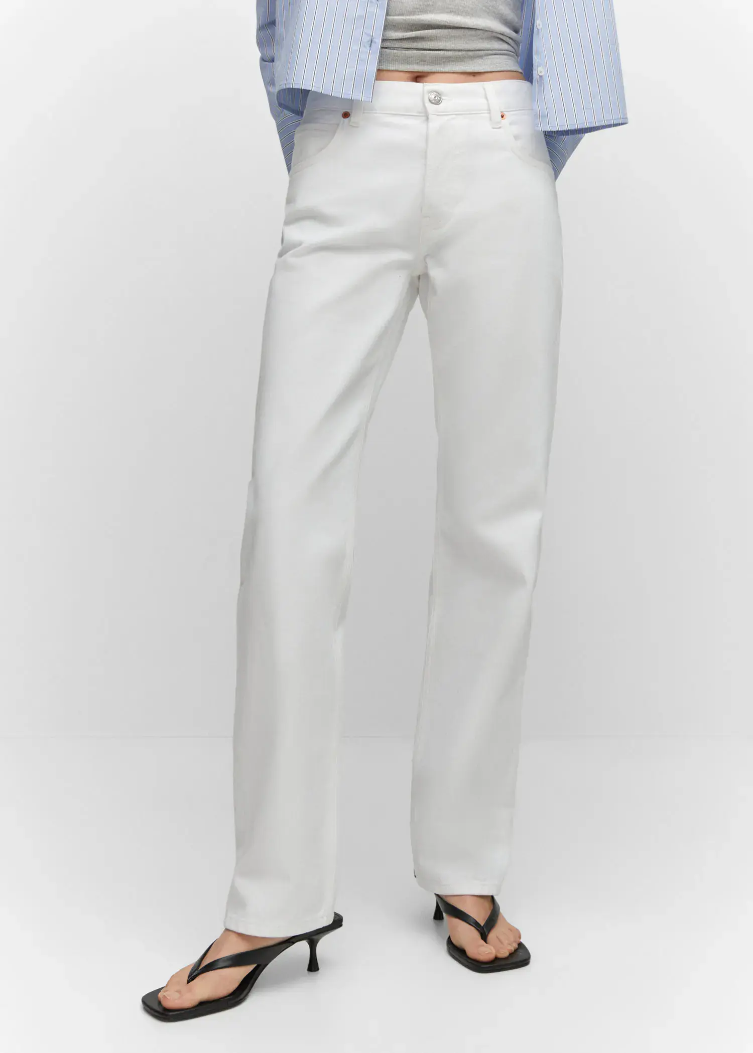 Mango Mid-rise straight jeans. a person wearing white pants and a white shirt. 