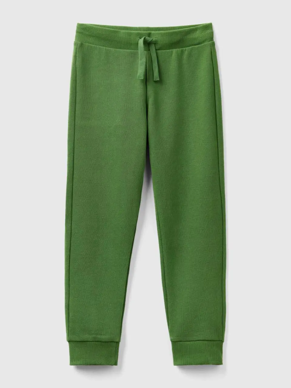 Benetton sporty trousers with drawstring. 1