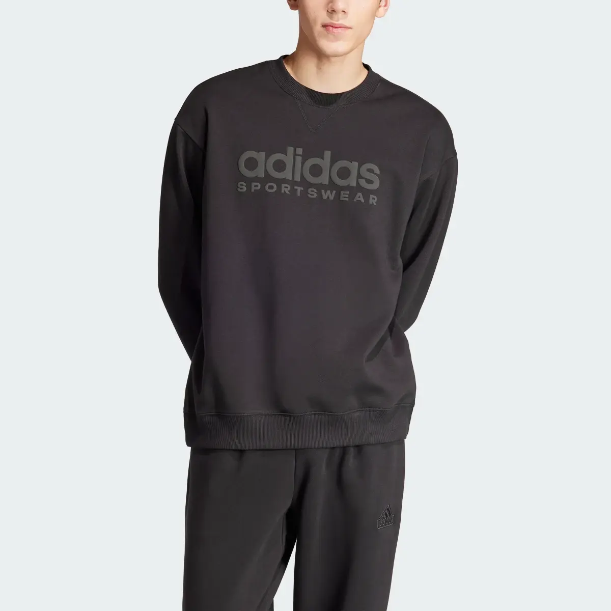 Adidas ALL SZN Fleece Graphic Sweatshirt. 1