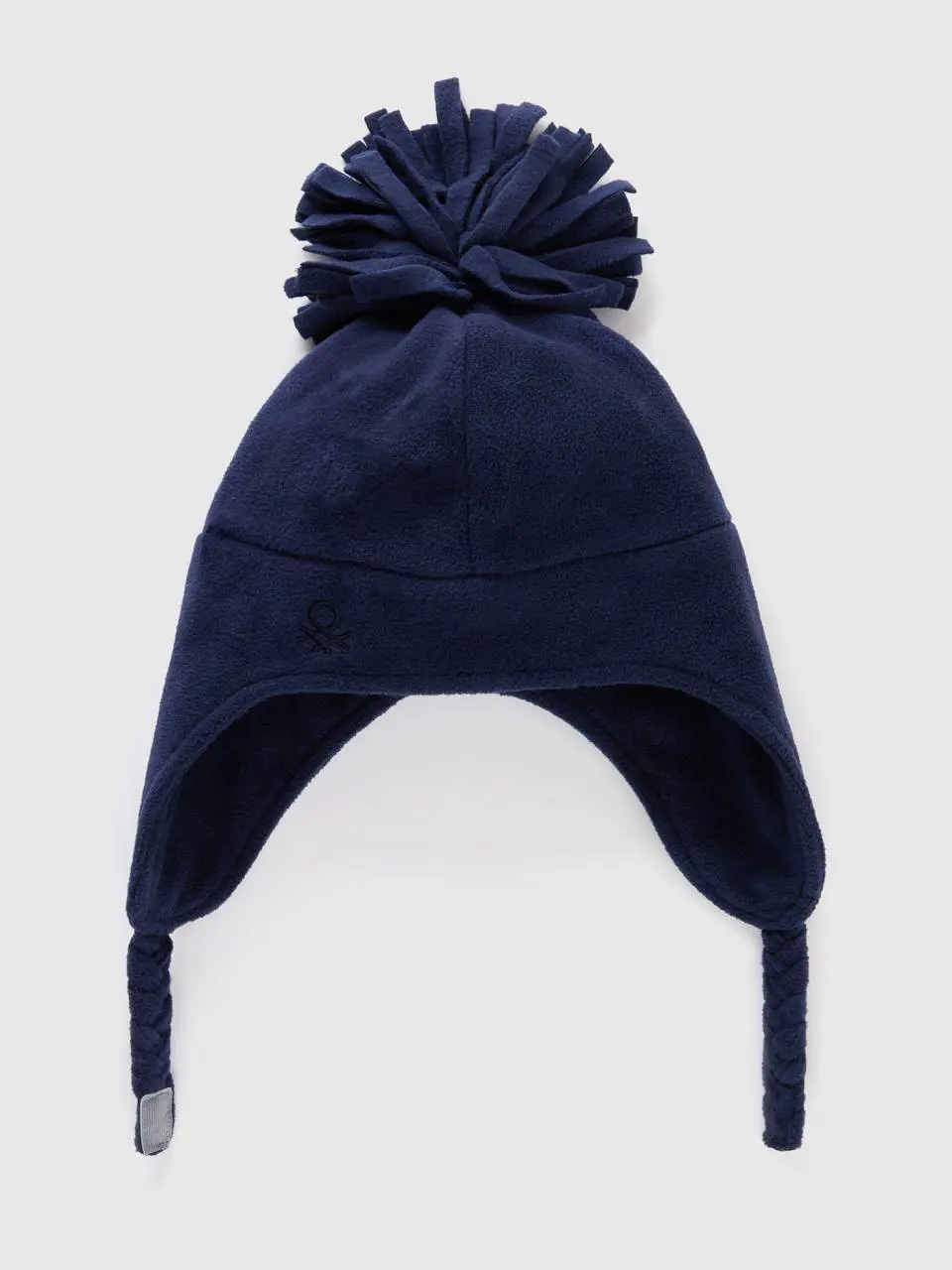 Benetton hat with earflaps and pom pom. 1