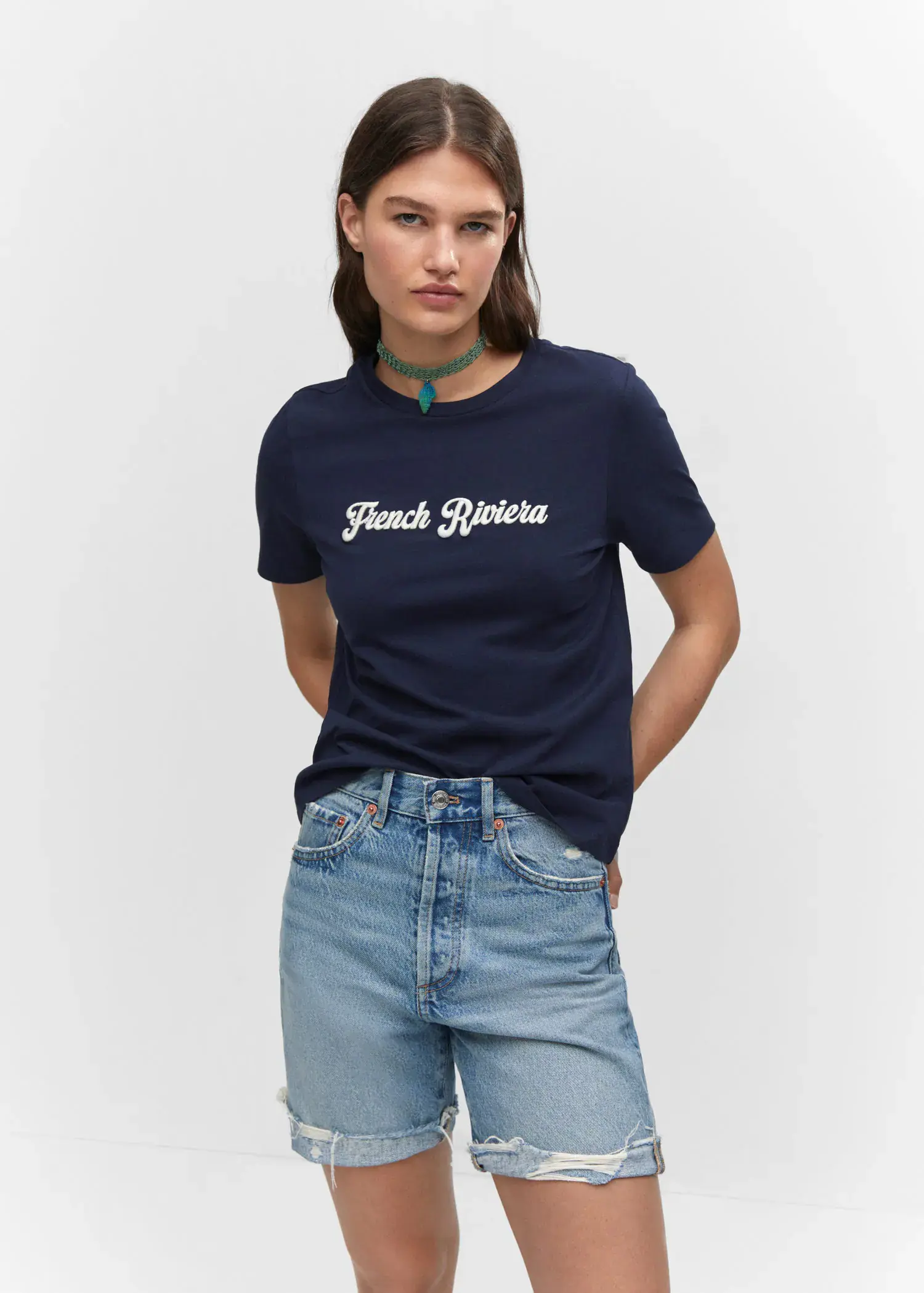 Mango Embroidered message T-shirt. a woman wearing a t-shirt with french riviera written on it 