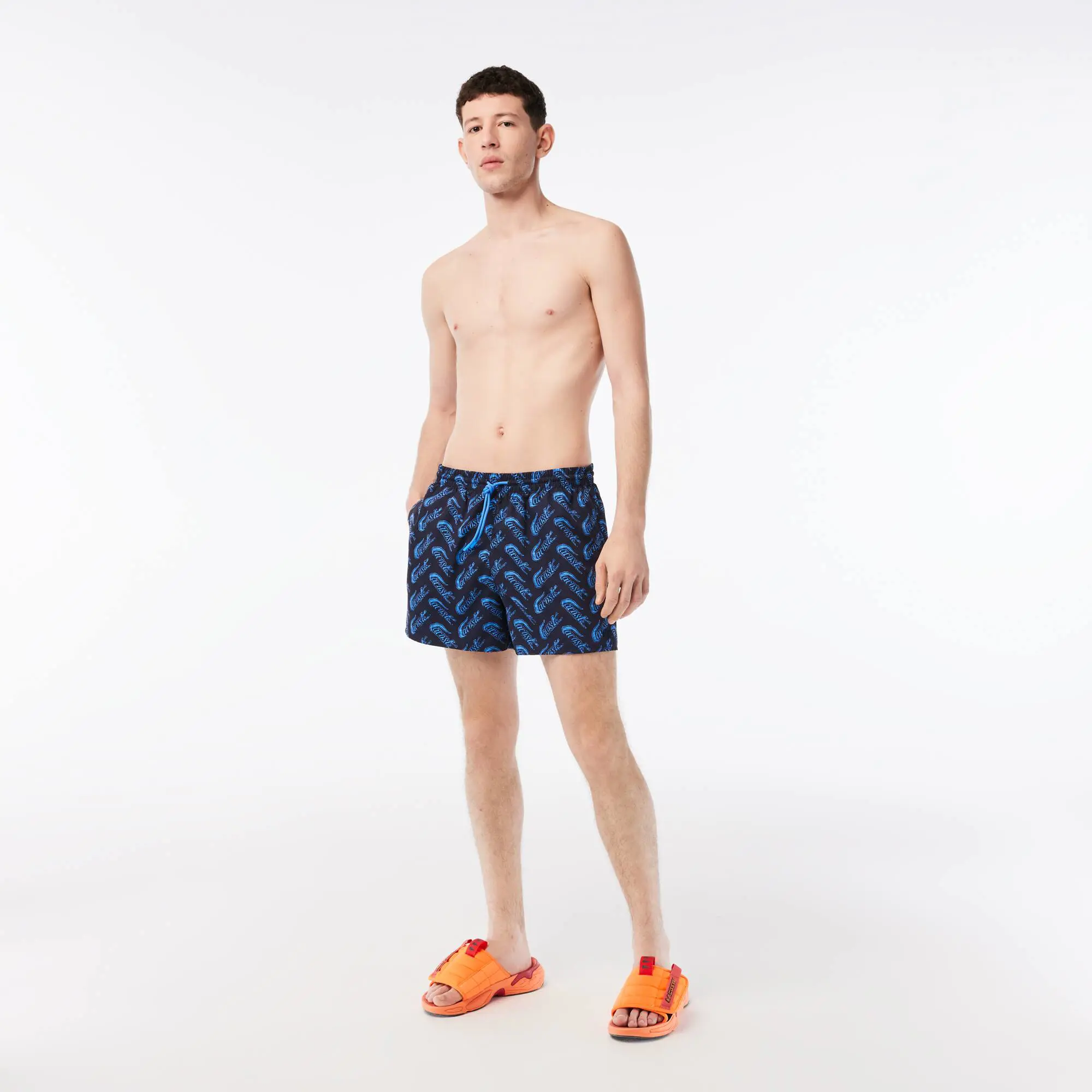 Lacoste Men’s Lacoste Recycled Polyester Print Swim Trunks. 1