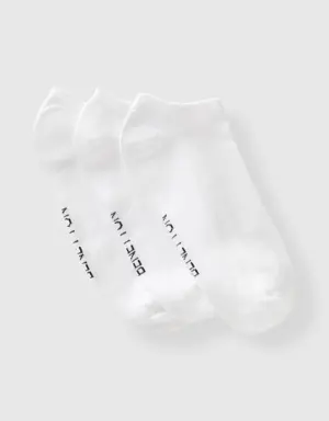three pairs of short socks