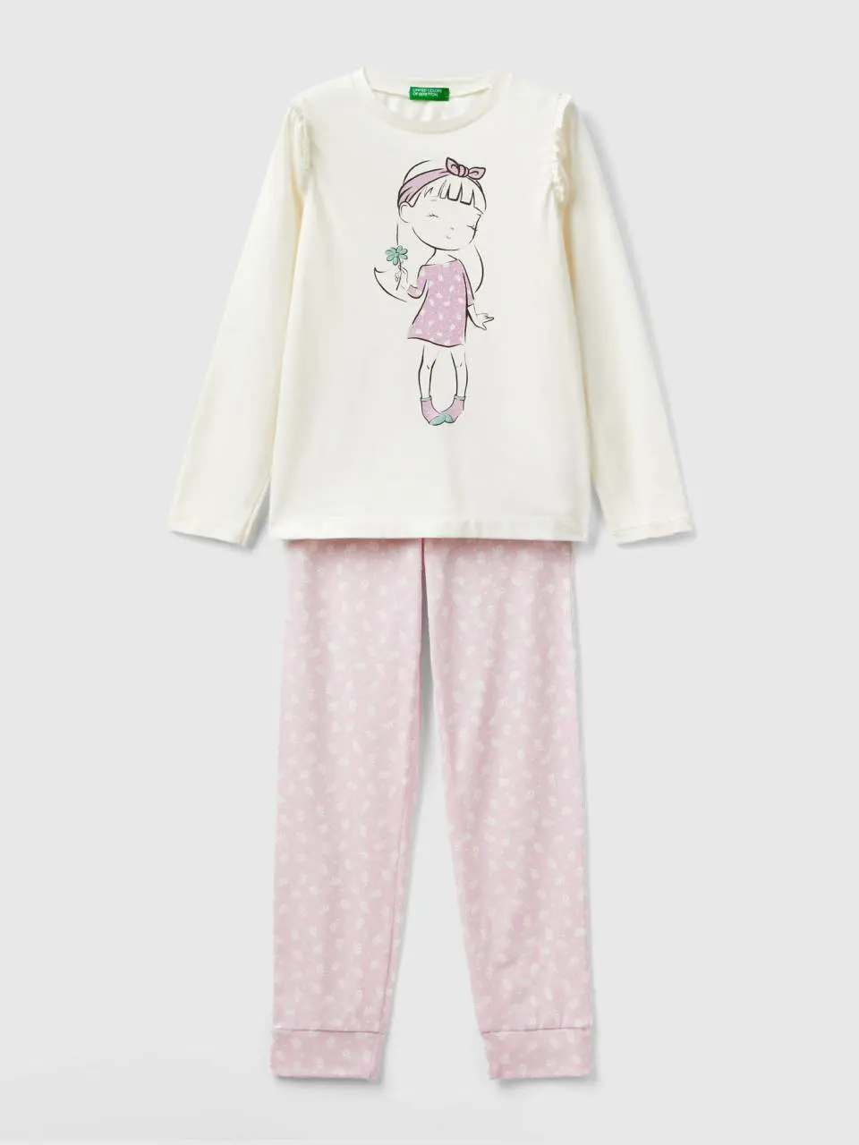 Benetton pyjamas with flowers and glitter. 1