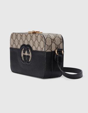 Top handle bag with cut-out Interlocking G