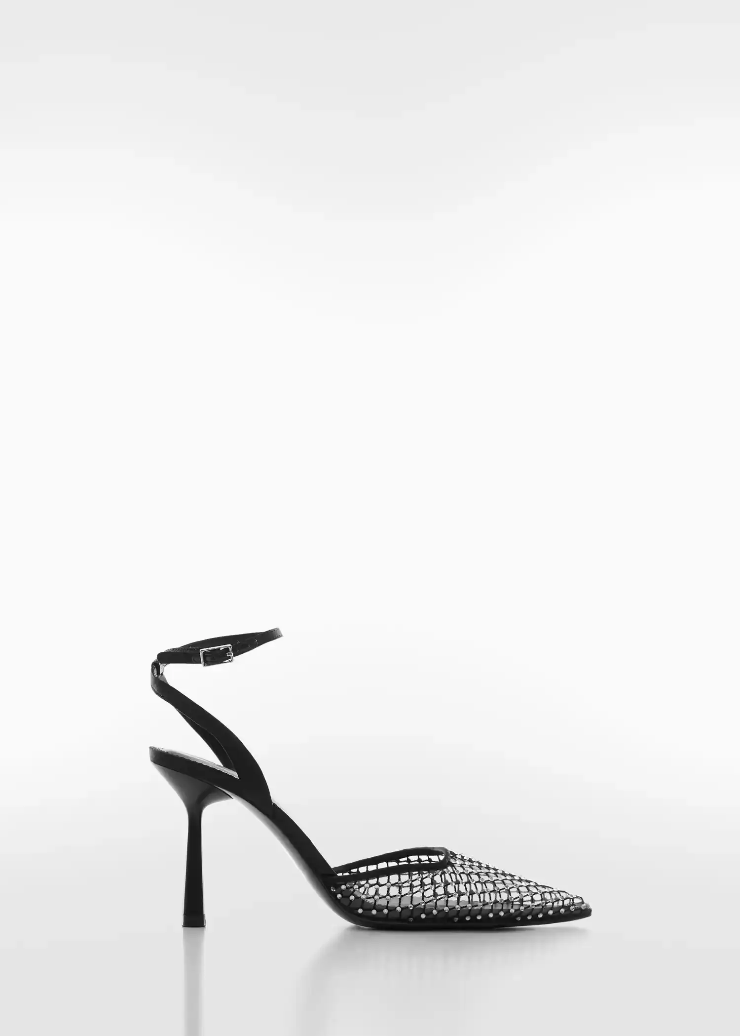 Mango Rhinestone mesh shoe. a black and white photo of a pair of high heels. 